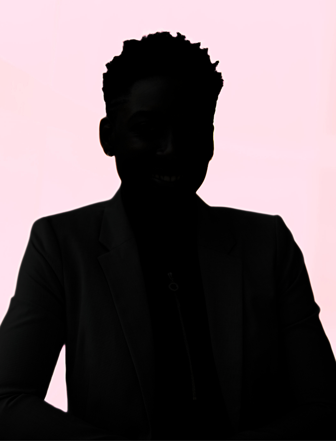 A silhouette of a person with short hair against a lavender-colored background